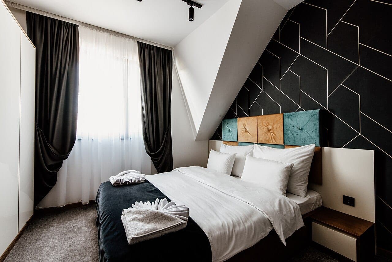 Bedroom with a stylish headboard