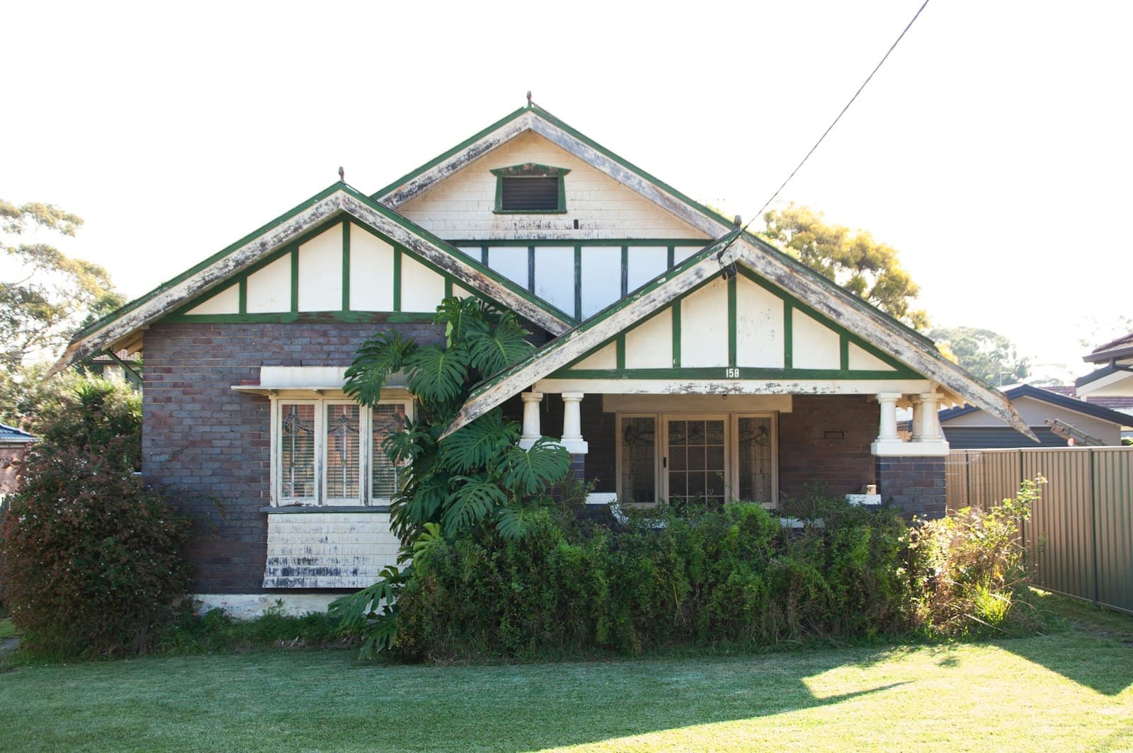 Federation brick house with a gabled roof and deep front verandah